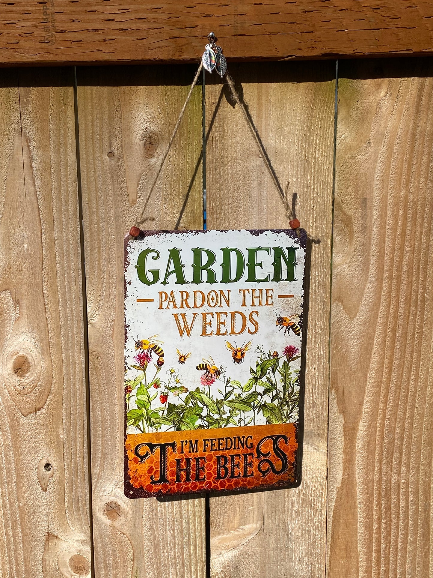 Happy Garden Bee Pardon the Weeds sign